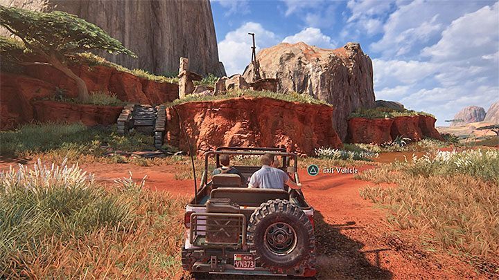Przejazd możesz rozpocząć od zniszczenia pobliskiego pierwszego kopca (uderz w niego autem) - Uncharted 4 Kres Złodzieja: Rozdział 10 Dwanaście wież - solucja, opis przejścia - Uncharted 4: Kres Złodzieja - poradnik do gry