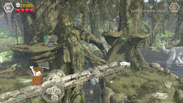 Z drzewa będziesz mógł wykonać skok ze spadochronem do miejsca wskazanego na obrazku drugim - Dolina żyrosfer | Jurassic World - sekrety w misjach - LEGO Jurassic World - poradnik gry