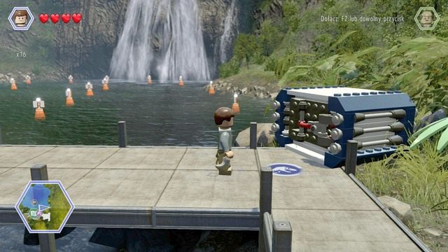 Podejdź do pojemnika jako Owen i zniszcz zaczep by uzyskać dostęp do klocków - Lądowisko helikoptera | Jurassic Park - sekrety - LEGO Jurassic World - poradnik gry