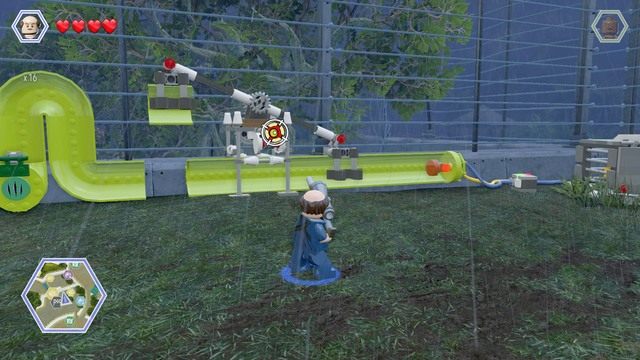 Strzel w widoczną na obrazku tarczę, zmień postać na kompsa i wejdź do rury z lewej strony - Terytorium mięsożerców | Jurassic Park - sekrety - LEGO Jurassic World - poradnik gry