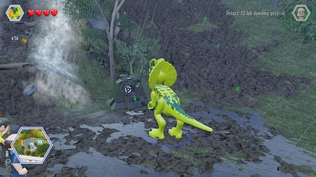 Podejdź jako dilofozaur do kolejnego czarnego pojemnika i zniszcz go za pomocą jadu - Trasa wschodniego doku | Jurassic Park - sekrety - LEGO Jurassic World - poradnik gry