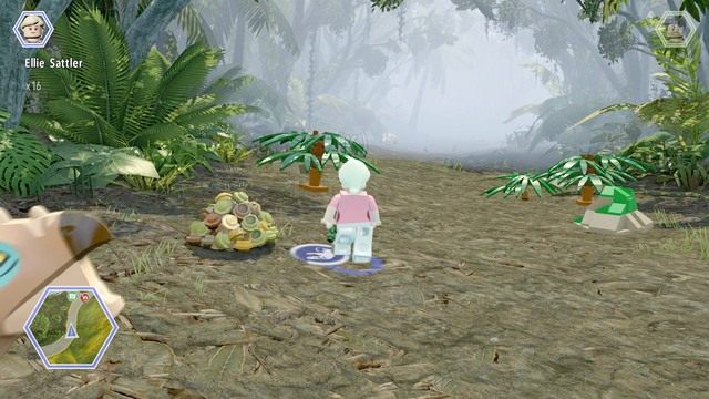 Po dotarciu na miejsce, podejdź jako Ellie do odchodów i wyłów z nich liść - Cienisty zagajnik | Jurassic World - sekrety - LEGO Jurassic World - poradnik gry