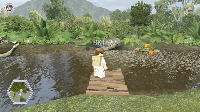 Wejdź na platformę jako Paul i wyceluj w tratwę, na której dryfuje złoty klocek - Dolina żyrosfer | Jurassic World - sekrety - LEGO Jurassic World - poradnik gry