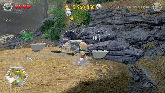 Zniszcz obiekt z klocków obok skarpy i wykonaj z nich statyw - Tereny łowieckie | Jurassic Park The Lost World - sekrety - LEGO Jurassic World - poradnik gry