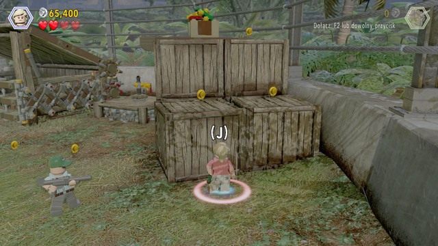 Jako Ellie, podejdź do prawej strony i wskocz na pudła po czym przesuń skrzynkę na samej górze - Witamy w parku | Jurasic Park - opis przejścia - LEGO Jurassic World - poradnik gry