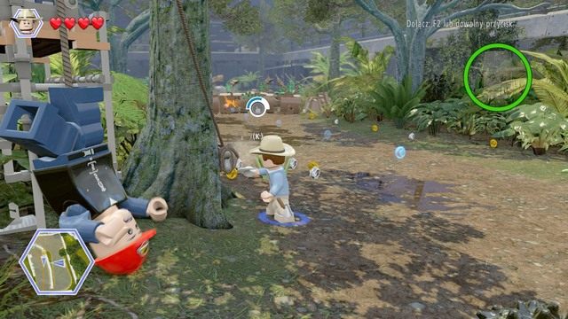 Po dostaniu się główną drogą do blokady, wyjdź z samochodu i udaj się przez małą bramkę - Utrata mocy | Jurasic Park - opis przejścia - LEGO Jurassic World - poradnik gry