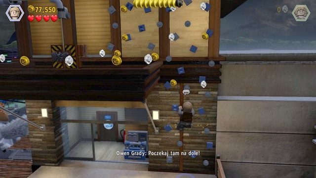 Podejdź do panelu sterowania i opuść roletę, którą Owen dostanie się na wyższe piętro - Wielkie starcie | Jurassic World - opis przejścia - LEGO Jurassic World - poradnik gry