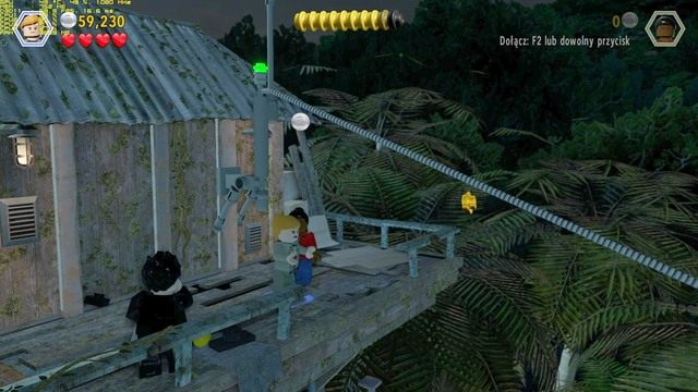 Po dostaniu się na dach, zjedź liną na daszek sąsiedni - Centrum komunikacyjne | Jurassic Park The Lost World - opis przejścia - LEGO Jurassic World - poradnik gry