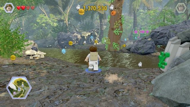 Żeby przejść na drugą stronę rzeki, podejdź Paulem do pokazanego na obrazku miejsca i użyj liny na zaczepie - Spinozaur | Jurassic Park III - opis przejścia - LEGO Jurassic World - poradnik gry