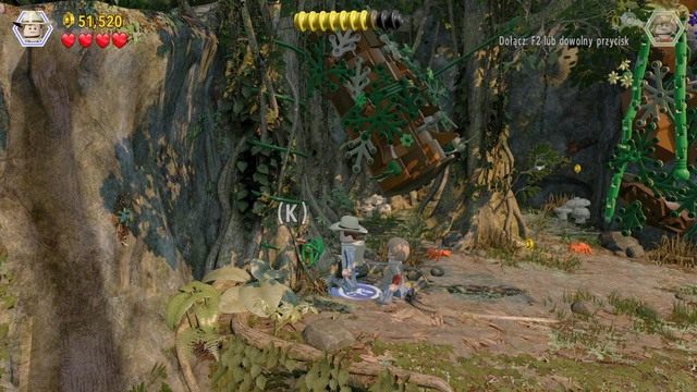 Po dostaniu się na kolejne piętro, przejdź na lewą stronę i przetnij rośliny blokujące dostęp do pojemnika - Eric Kirby | Jurassic Park III - opis przejścia - LEGO Jurassic World - poradnik gry