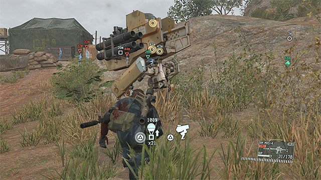 Fultonowaniem Walker Gearów zajmij się dopiero po zabezpieczeniu obozu - Wyeliminowanie wrogich maszyn kroczących | Misja 15 - Footprints of Phantoms - Metal Gear Solid V: The Phantom Pain - poradnik do gry