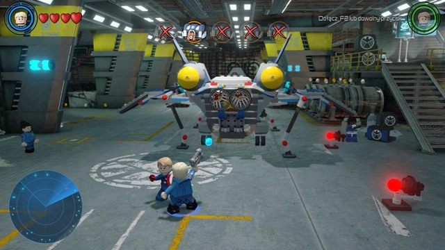Ostatni czyli piąty już pojemnik znajdziesz w samolocie na środku hangaru - Chaos na Hellicarrierze | Opis przejścia | LEGO Marvels Avengers - LEGO Marvels Avengers - poradnik do gry