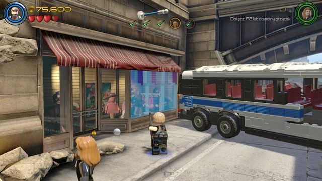 Następnych ludzi uratujesz ze sklepu znajdującego się po lewej stronie autobusu - Mściciele do boju | Opis przejścia | LEGO Marvels Avengers - LEGO Marvels Avengers - poradnik do gry