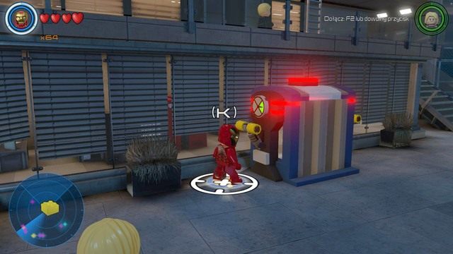 Podejdź do widocznego na obrazku pojemnika i opuść dwie dźwignie żeby go otworzyć - Złote klocki | Baza S.H.I.E.L.D. - sekrety | LEGO Marvels Avengers - LEGO Marvels Avengers - poradnik do gry