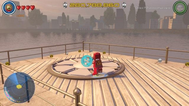 Kolejny złoty klocek ukryty jest pod widoczną na obrazku osłoną we wschodniej części Manhattanu - Złote klocki | Północny Manhattan - sekrety | LEGO Marvels Avengers - LEGO Marvels Avengers - poradnik do gry
