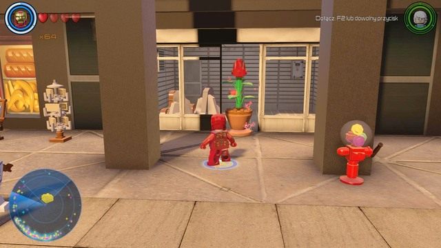 Po lewej stronie od wieżowca, na którym znalazłeś klocek z numerkiem 19, znajdziesz sklep - Złote klocki | Północny Manhattan - sekrety | LEGO Marvels Avengers - LEGO Marvels Avengers - poradnik do gry