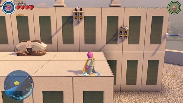 Na dachu budynku we wschodniej części północnego Manhattanu znajdziesz pojemnik i drążki z przełącznikami - Złote klocki | Północny Manhattan - sekrety | LEGO Marvels Avengers - LEGO Marvels Avengers - poradnik do gry