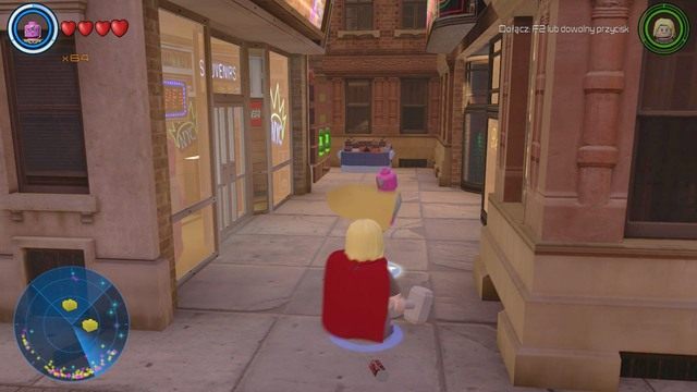 Między budynkami, niedaleko Marvel znajdziesz miejsce pokazane na obrazku - Złote klocki | Północny Manhattan - sekrety | LEGO Marvels Avengers - LEGO Marvels Avengers - poradnik do gry