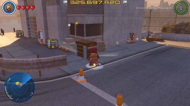 W południowej części południowego Manhattanu znajdziesz pokazany na obrazku budynek - Złote klocki | Południowy Manhattan - sekrety | LEGO Marvels Avengers - LEGO Marvels Avengers - poradnik do gry