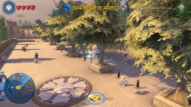 Kolejny klocek znajdziesz pod widoczną na obrazku osłoną w centralnej części południowego Manhattanu - Złote klocki | Południowy Manhattan - sekrety | LEGO Marvels Avengers - LEGO Marvels Avengers - poradnik do gry