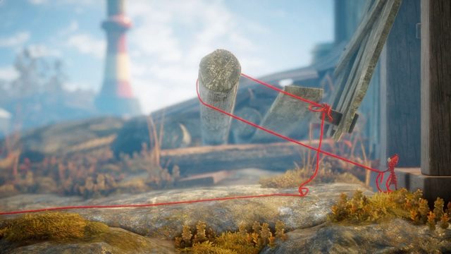 Otwórz drzwi ciągnąc sznurek przez drewniany pal - Poziom 2 - The Sea | Opis przejścia Unravel - Unravel - poradnik do gry