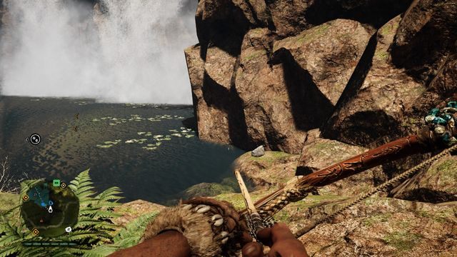 Pod skałami w pobliżu wodospadu, poniżej stosu, który możesz zapalić - Ręce Daiszy 11-20 | Centralne Oros | Far Cry Primal - Far Cry Primal - poradnik do gry
