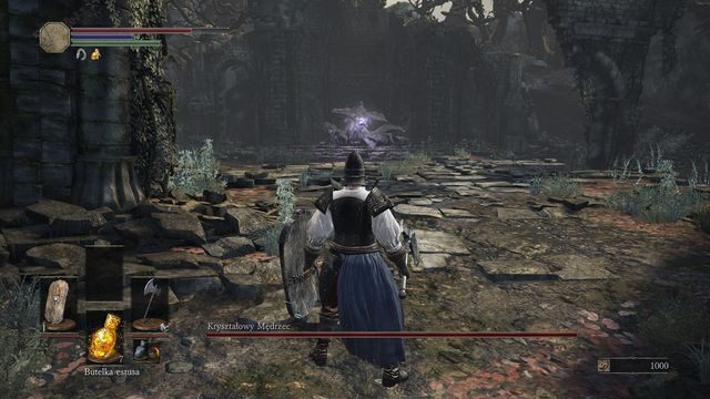 Boss atakuje głównie magicznie, więc w pierwszej kolejności warto zaopatrzyć się w ubiór zapewniający solidną ochronę przed tego typu atakami. - Kryształowy Mędrzec | Bossowie w Dark Souls 3 - Dark Souls III - opis przejścia i sekrety