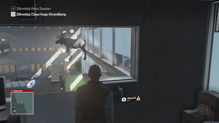 Wystarczy zwolnić mechanizm korby, a wielki łoś spadnie na Strandberga. - Hitman: Zamordowanie Clausa Hugo Strandberga, Marrakesz - Złota klatka | Solucja - Hitman - poradnik do gry