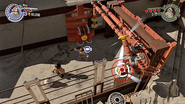 Trafienie w przycisk doprowadzi do dużej eksplozji i odblokowania nowego przejścia - Rozdział 3 - Przyczółek Niima | Tryb fabularny - LEGO Gwiezdne wojny: Przebudzenie Mocy - poradnik do gry