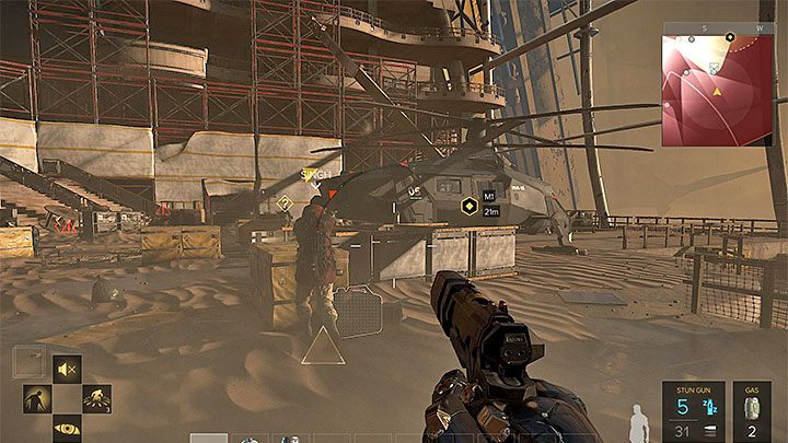 Singh broni się w pobliżu śmigłowca - Zakupy na Czarnym Rynku - zadanie główne | Dubaj | Deus Ex Rozłam Ludzkości - Deus Ex: Rozłam Ludzkości - poradnik do gry