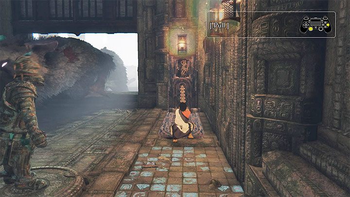 Musisz dotrzeć do pokazanego na obrazku uchwytu - Przejście przez dwie sale z obracającymi się strażnikami | The Last Guardian - The Last Guardian - poradnik do gry