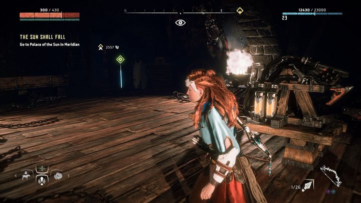 Aloy uzbroiła się w nakładki na uszy, dzięki którym może zbliżyć się do urządzenia przy wejściu do piwnicy i je wyłączyć - Horizon Zero Dawn: Na ziemie graniczne (Into the Borderlands) solucja - Horizon Zero Dawn - poradnik, solucja