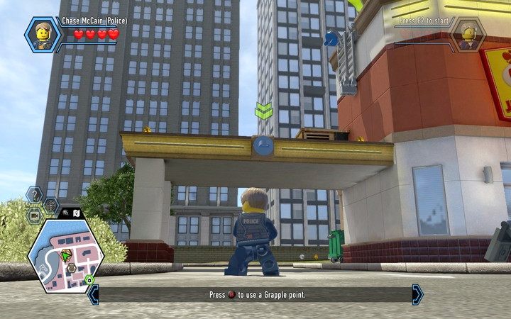 Używając liny możesz zaczepiać się o haki i przedostawać w niedostępne osbzary - Początek zadania | Rozdział 2 w Lego City: Tajny Agent - LEGO City: Tajny Agent - poradnik do gry