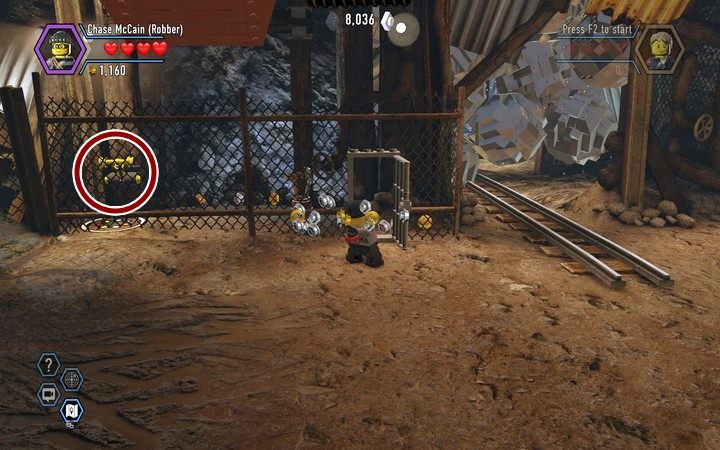 Użyj żółtej dźwigni za siatką, by otrzymać klocki na budowę skrzyni - Kopalnia | Rozdział 3 w Lego City: Tajny Agent - LEGO City: Tajny Agent - poradnik do gry