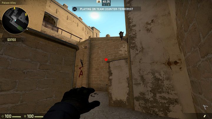 Ustaw się bokiem, pośrodku drzwi i wyceluj w punkt zaznaczony na obrazku - Mirage | Mapy turniejowe | CS GO - CS GO - poradnik do gry