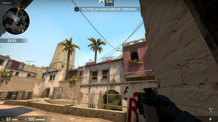 Ustaw się w rogu budynku i wyceluj w oznaczony punkt na linii dachu - Mirage | Mapy turniejowe | CS GO - CS GO - poradnik do gry