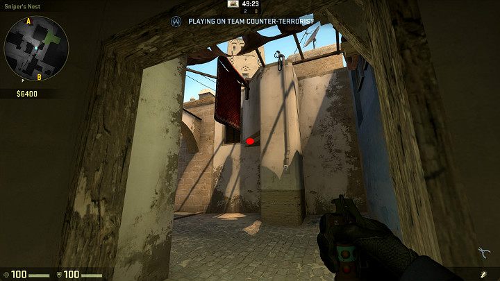Wychodząc od strony dżungli w kierunku punktu A wyceluj w oznaczone miejsce i rzuć granatem korzystając z LPM - Mirage | Mapy turniejowe | CS GO - CS GO - poradnik do gry