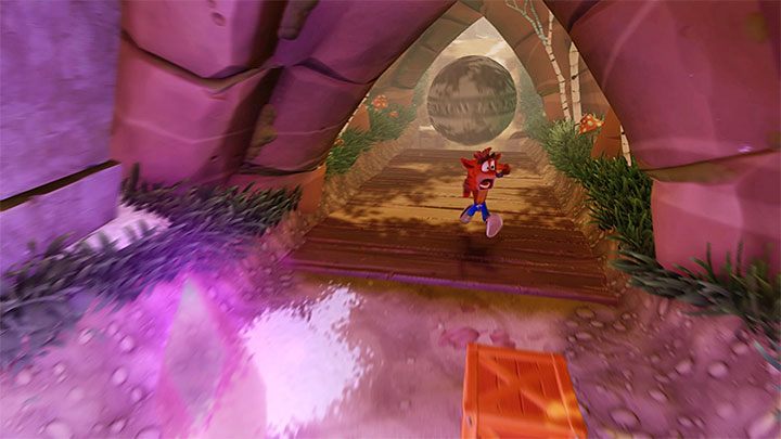 Podczas zaliczania tego etapu wypatruj fioletowego kryształu, który będzie znajdował się po lewej stronie (powyższy obrazek) - Crash Dash | Jungle Warp Room | Opis przyjścia | Crash Bandicoot N. Sane Trilogy - Crash Bandicoot N. Sane Trilogy - poradnik do gry