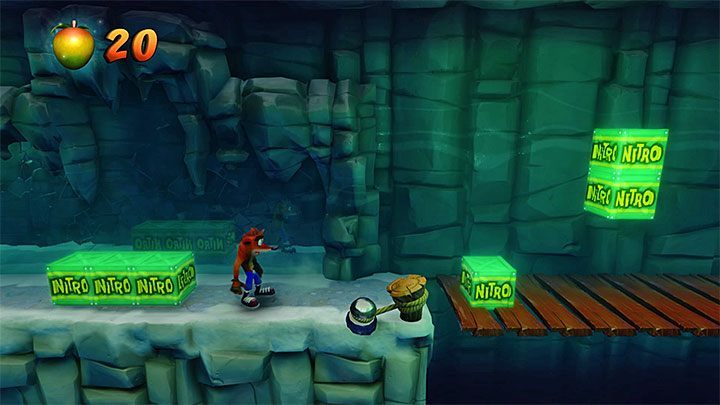W jednej z kolejnych lokacji ostrożnie przeskocz nad dwoma zielonymi skrzyniami - Snow Biz | Ice Warp Room | Opis przejścia | Crash Bandicoot N. Sane Trilogy - Crash Bandicoot N. Sane Trilogy - poradnik do gry