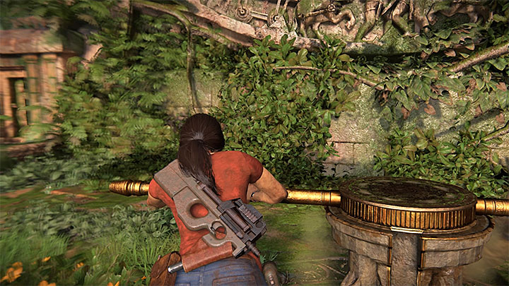 Użyj obrotowego mechanizmu żeby rozsunąć bramę - 4 - Opuszczenie Ghatów Zachodnich | Opis przejścia - Uncharted: Zaginione Dziedzictwo - poradnik do gry