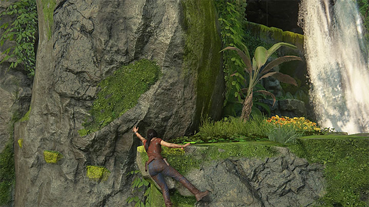 Po wylądowaniu na nowej stabilnej skalnej półce najpierw udaj się w lewo - 8 - Dotarcie na stację kolejową | Wspólniczki | Opis przejścia - Uncharted: Zaginione Dziedzictwo - poradnik do gry
