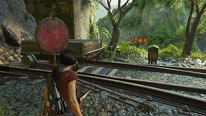 Użyj zwrotnicy po tym jak przepchniesz na sam koniec platformę - 8 - Dotarcie na stację kolejową | Wspólniczki | Opis przejścia - Uncharted: Zaginione Dziedzictwo - poradnik do gry
