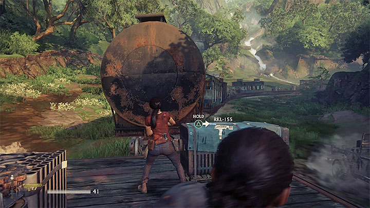 Podczas przeprawy po pędzącym pościgu dotrzesz docelowo do pokazanego na obrazku wagonu-cysterny - 9 - Ostatnia stacja - End of the Line | Opis przejścia - Uncharted: Zaginione Dziedzictwo - poradnik do gry