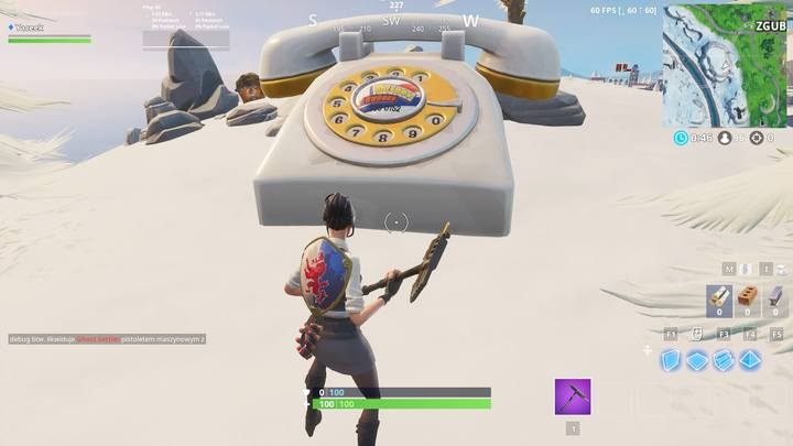 Biały telefon znajduje się obok Zgubnych Ziem, a czerwony niedaleko Leniwej Laguny. - Odwiedź telefon, fortepian i trofeum | Wyzwanie w Fortnite - Fortnite: Battle Royale - poradnik do gry