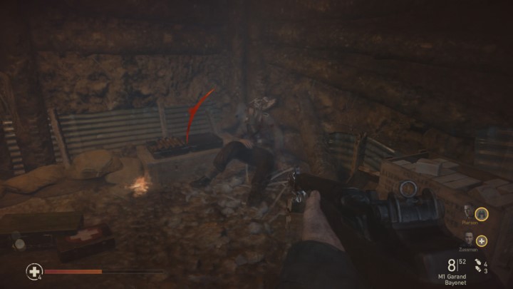 W środku, przy martwym żołnierzu, znajdziesz ostatnie memento na tej mapie - Gas Mask - Call of Duty WW2: Operacja Kobra - Pamiątki, sekrety, znajdźki - Call of Duty: WW2 - poradnik do gry