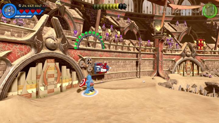 Ostatni minizestaw znajdziesz po lewej stronie areny, w wejściu z którego wychodzą wrogowie w drugiej fazie misji - Sekrety Misja 15 - Red King i jego ring | LEGO Marvel Super Heroes 2 - LEGO Marvel Super Heroes 2 - poradnik do gry