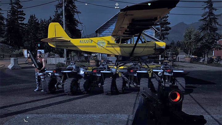 Po tym jak quad pojawi się przed garażem usiądź na nim i podjedź nim do samolotu - Śmierć z przestworzy - jak zbombardować 4 pojazdy ? | Far Cry 5 - Far Cry 5 - poradnik do gry