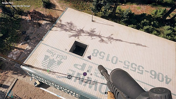 Skarb znajduje się wewnątrz zamkniętego hangaru na lotnisku - Lokacje kultu i skrytki prepperskie w Górach Whitetail | Góry Whitetail - Far Cry 5 - poradnik do gry