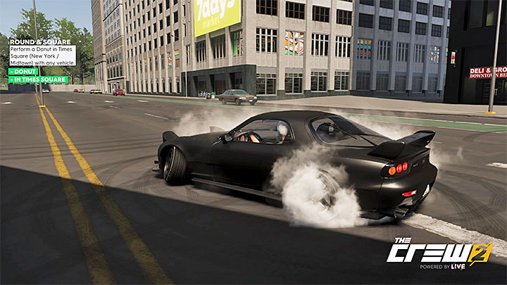 Opis: Wykręcz bączka dowolnym pojazdem na Times Square (Nowy Jork, śródmieście) - Album - Street Racing | Zadań fotograficznych w The Crew 2 - The Crew 2 - poradnik do gry