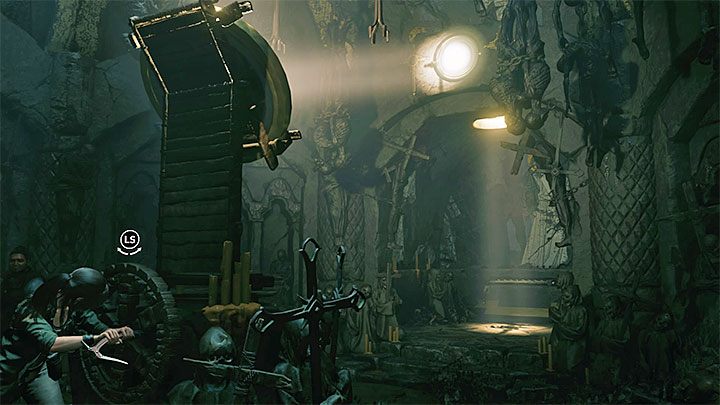 Podejdź do urządzenia z pokrętłem - Jak rozwiązać zagadkę z drogą krzyżową pod biblioteką w San Juan? | Tomb Raider - Shadow of the Tomb Raider - poradnik do gry